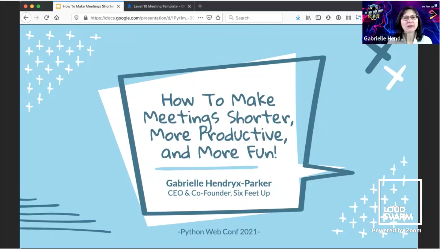 Screenshot of a conference stream showcasing a slideshow presentation with thumbnail of speaker in the upper right corner.